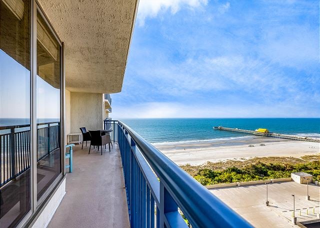 Balcony overlooking beach and pier