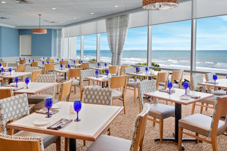 Tables at ocean view restaurant