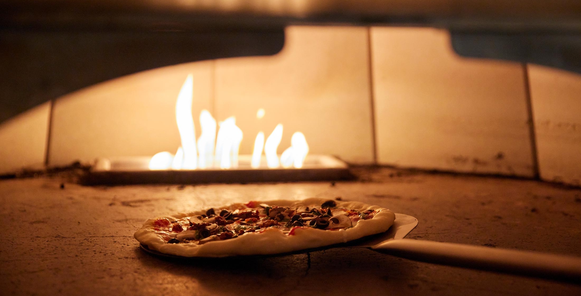 Pizza in wood-fired oven