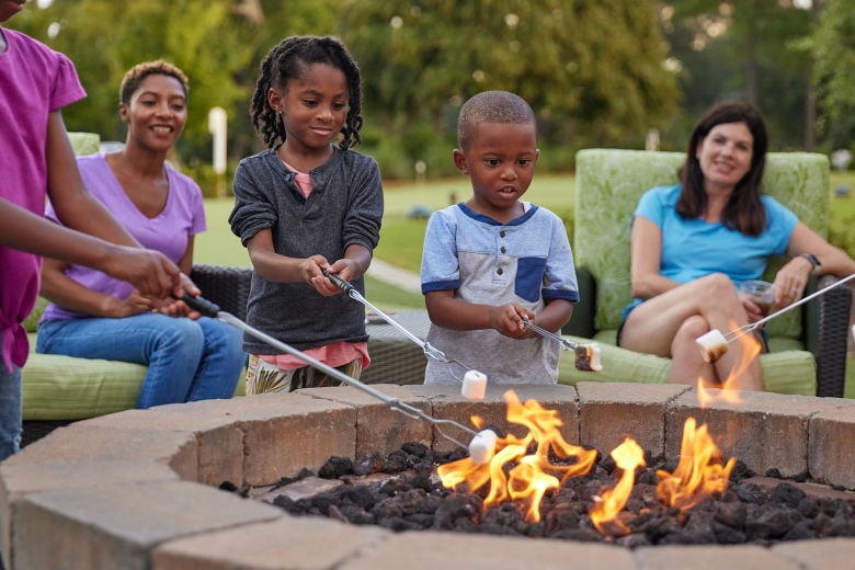 Kids roasting marshmallows