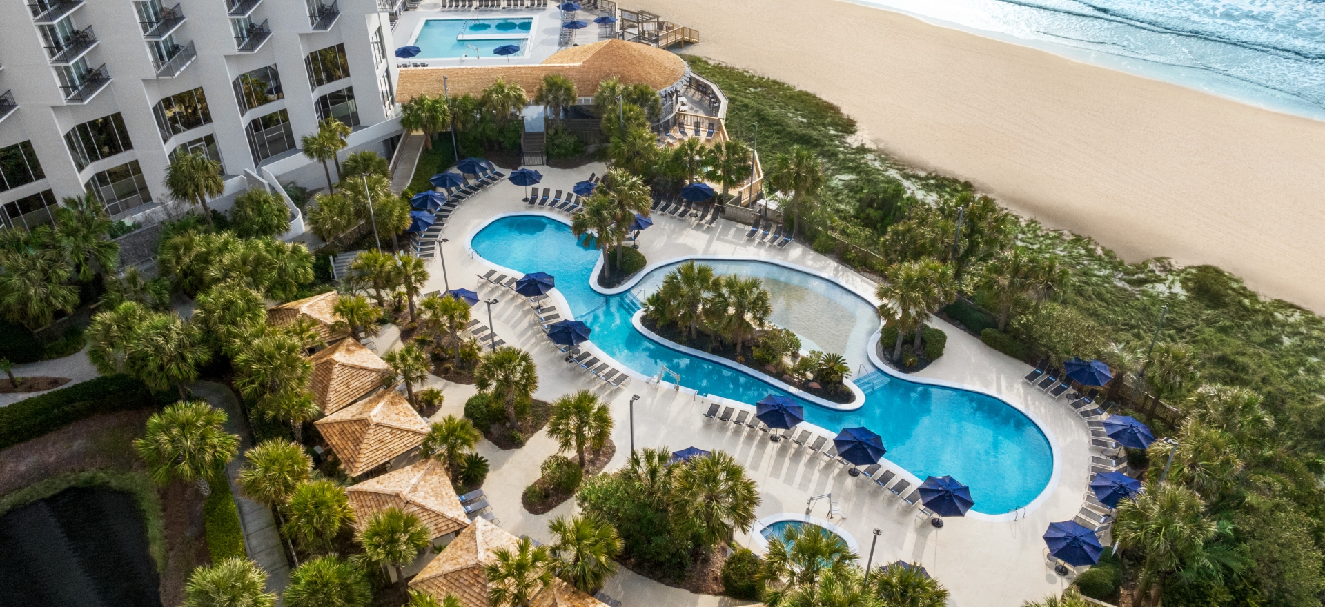 Aeriel of the sand bottom pool at Hilton