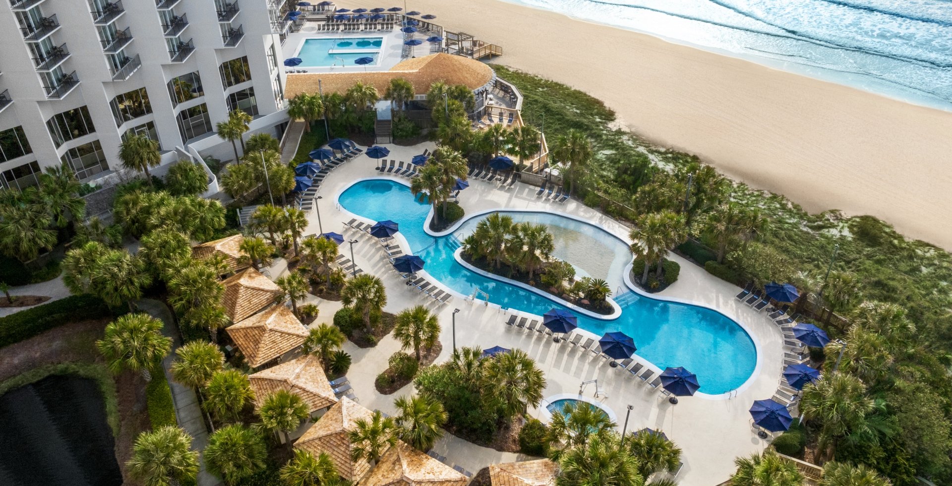 Aeriel of the sand bottom pool at Hilton