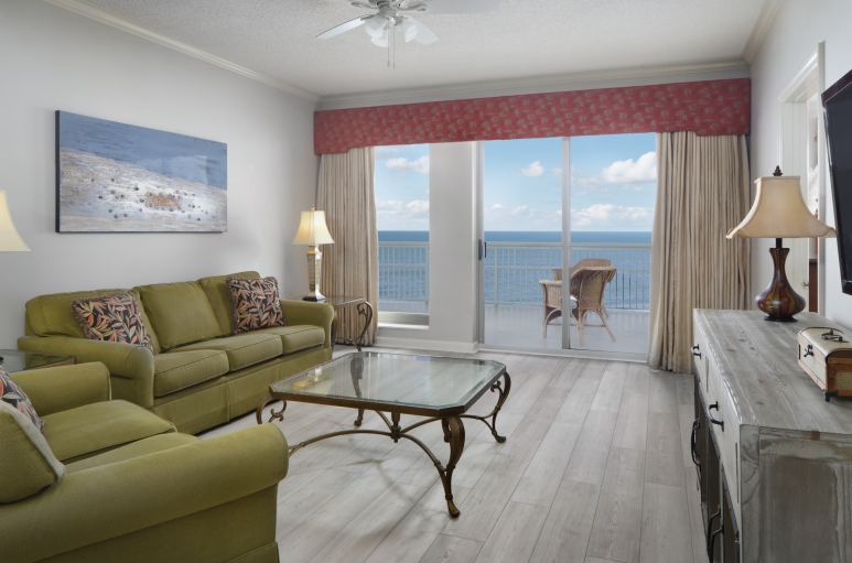 Margate tower living room with balcony access and an ocean view