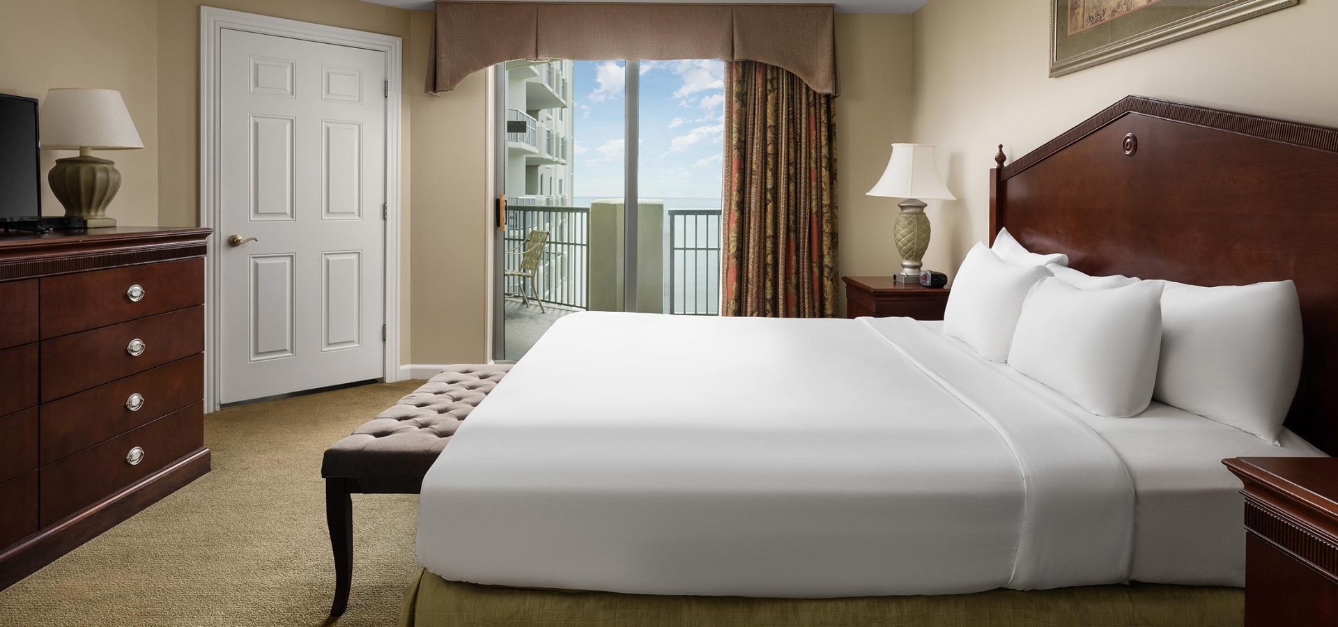 Royale Palms Condo bedroom with balcony access and ocean view