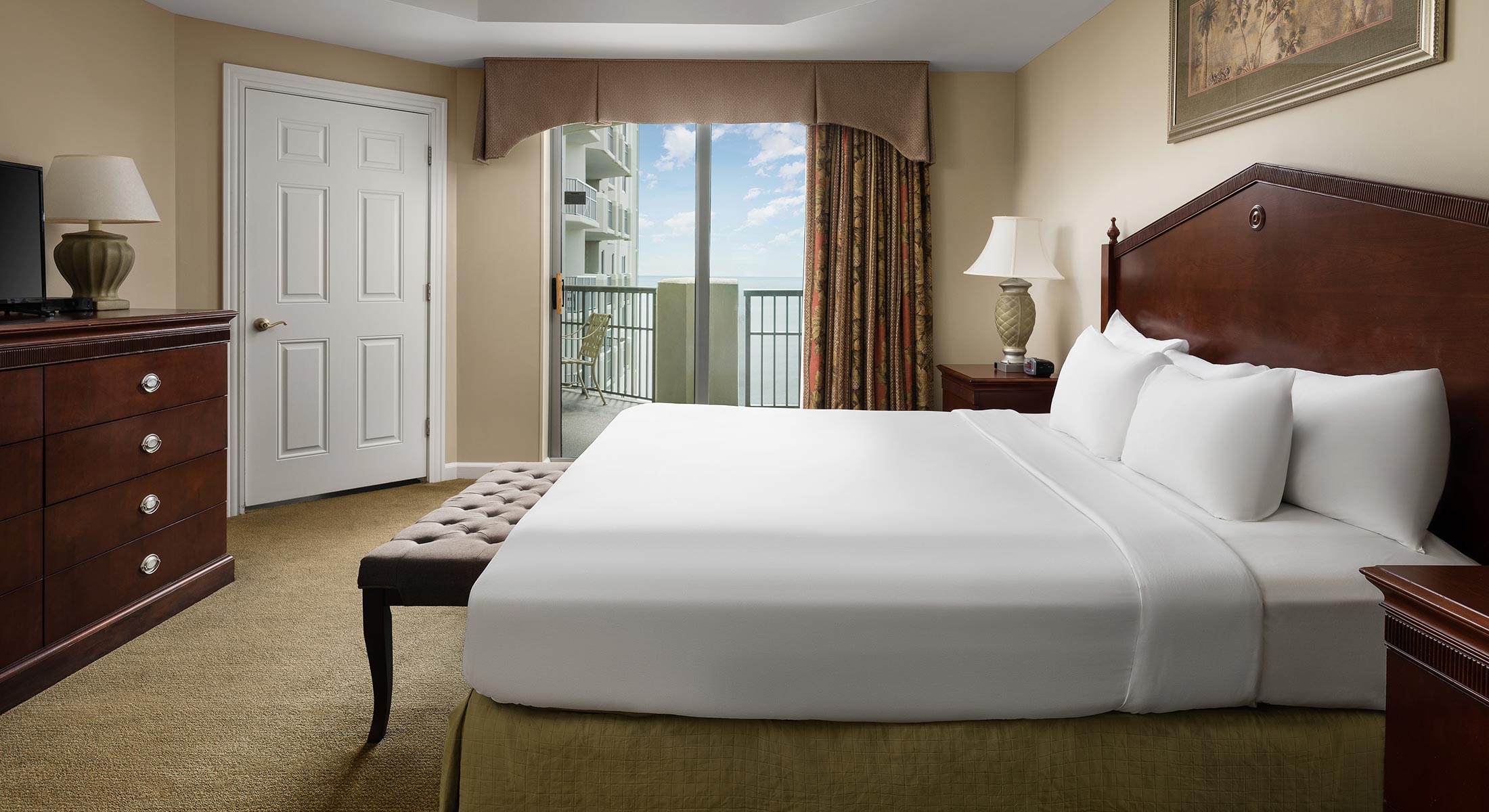 Royale Palms Condo bedroom with balcony access and ocean view