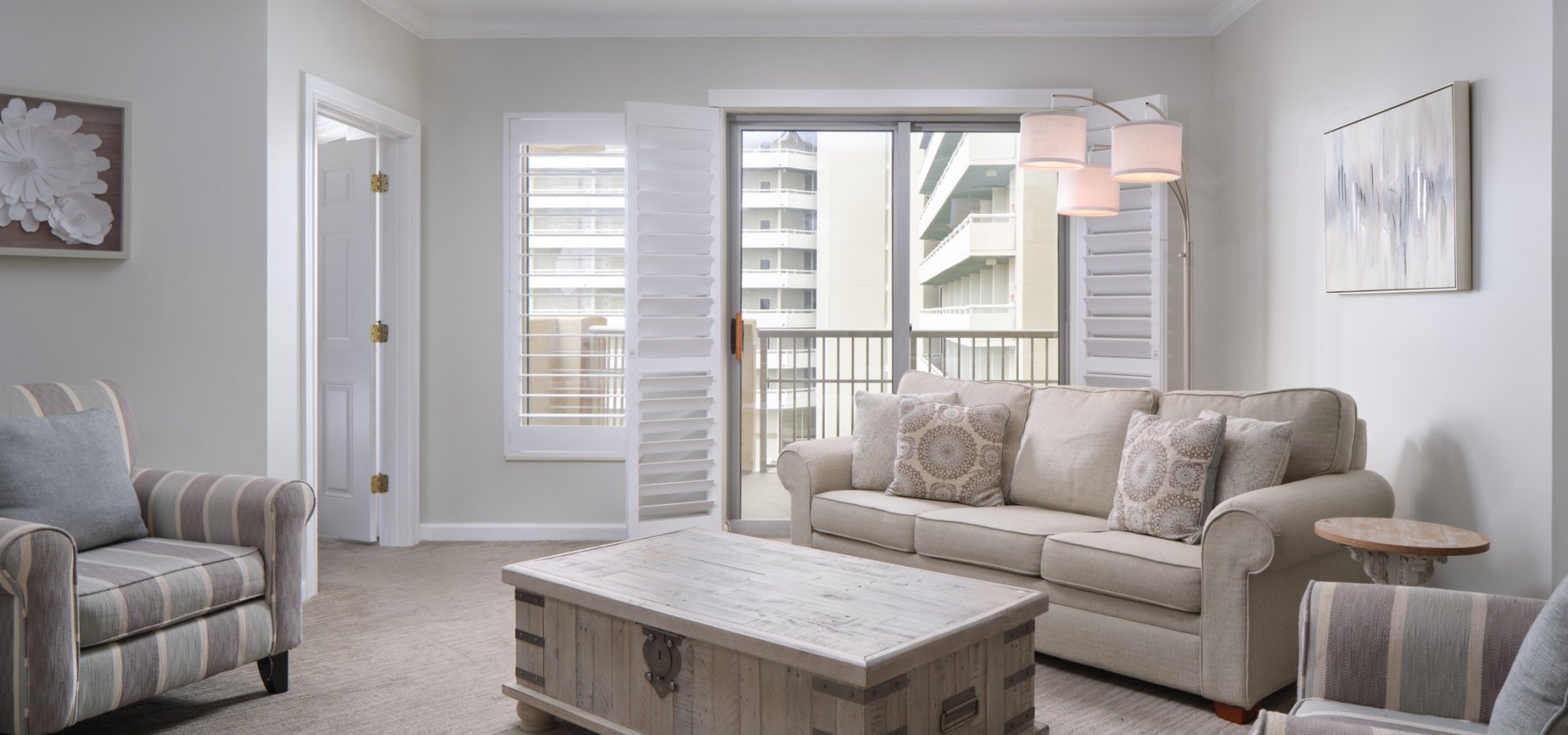 Royale Palms living room with balcony access