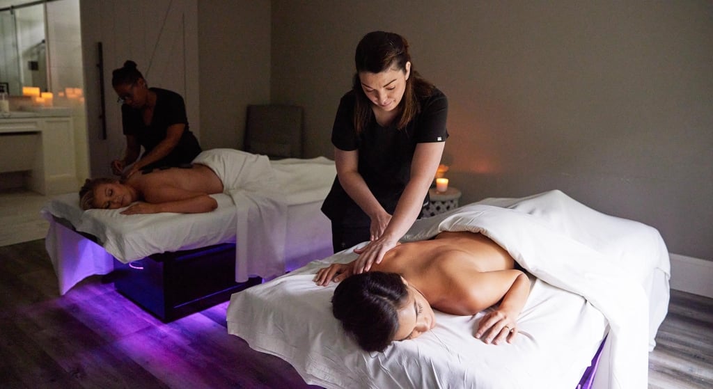 Two women receiving massages