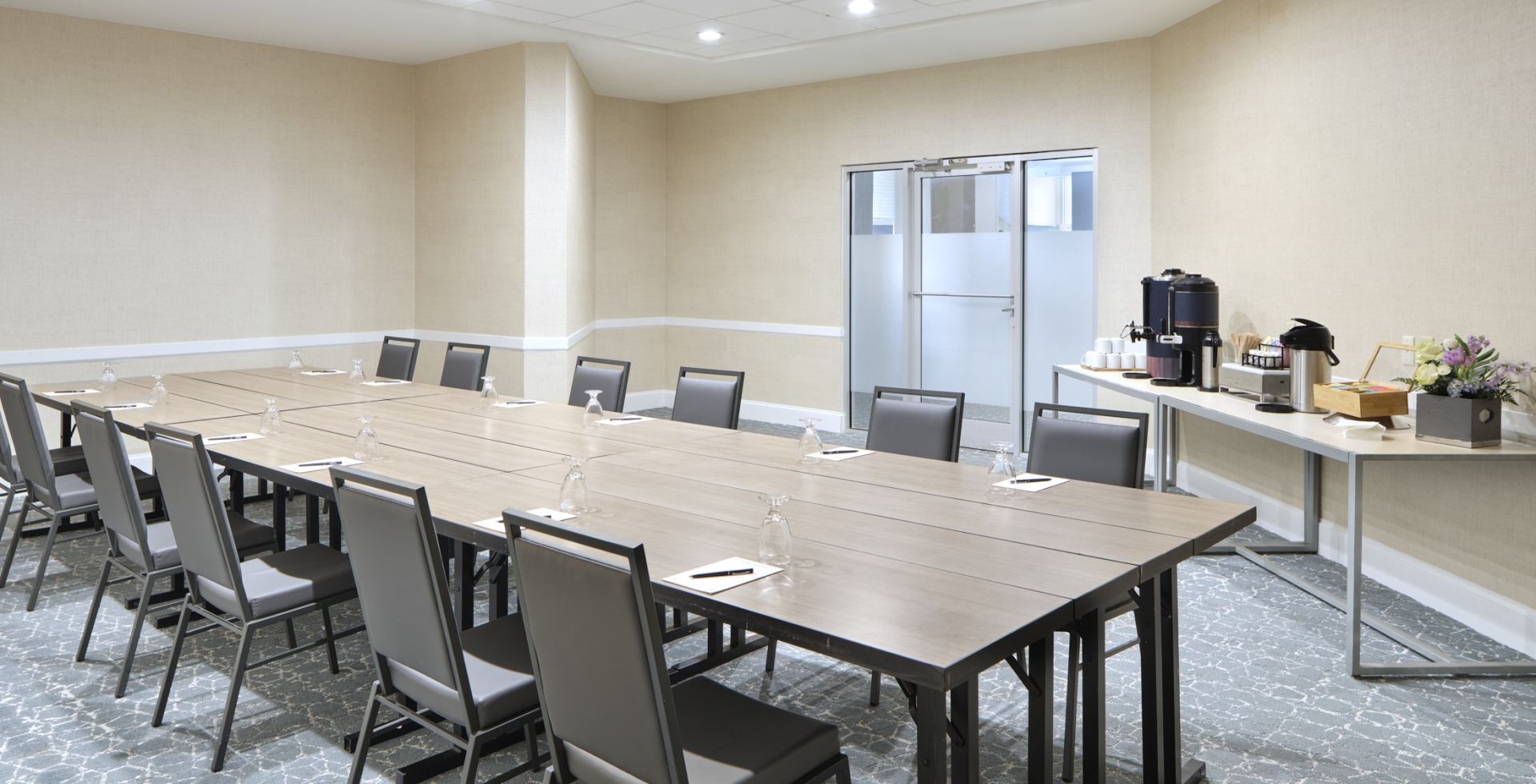 Azaela Boardroom set up for a meeting with a refreshment table