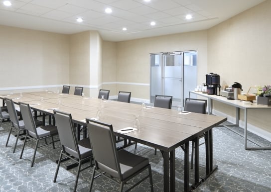 Azaela Boardroom set up for a meeting with a refreshment table