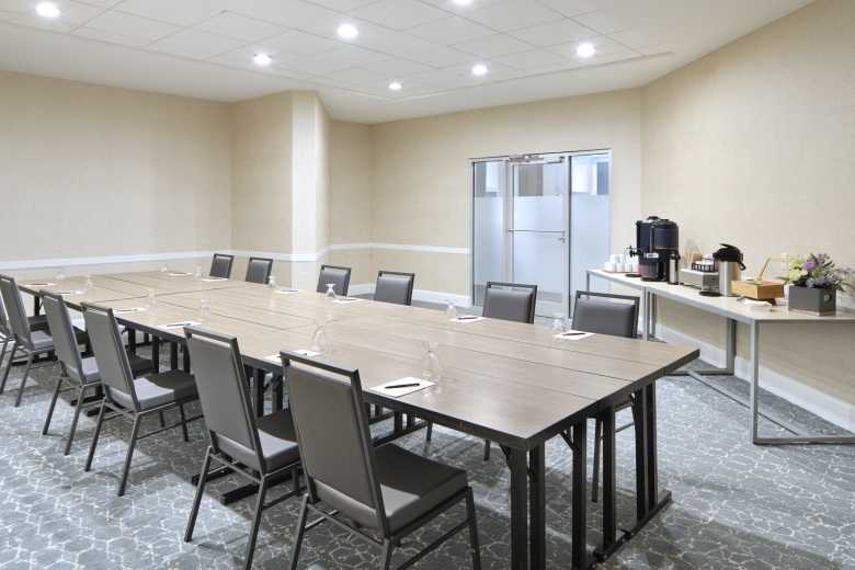 Azaela Boardroom set up for a meeting with a refreshment table