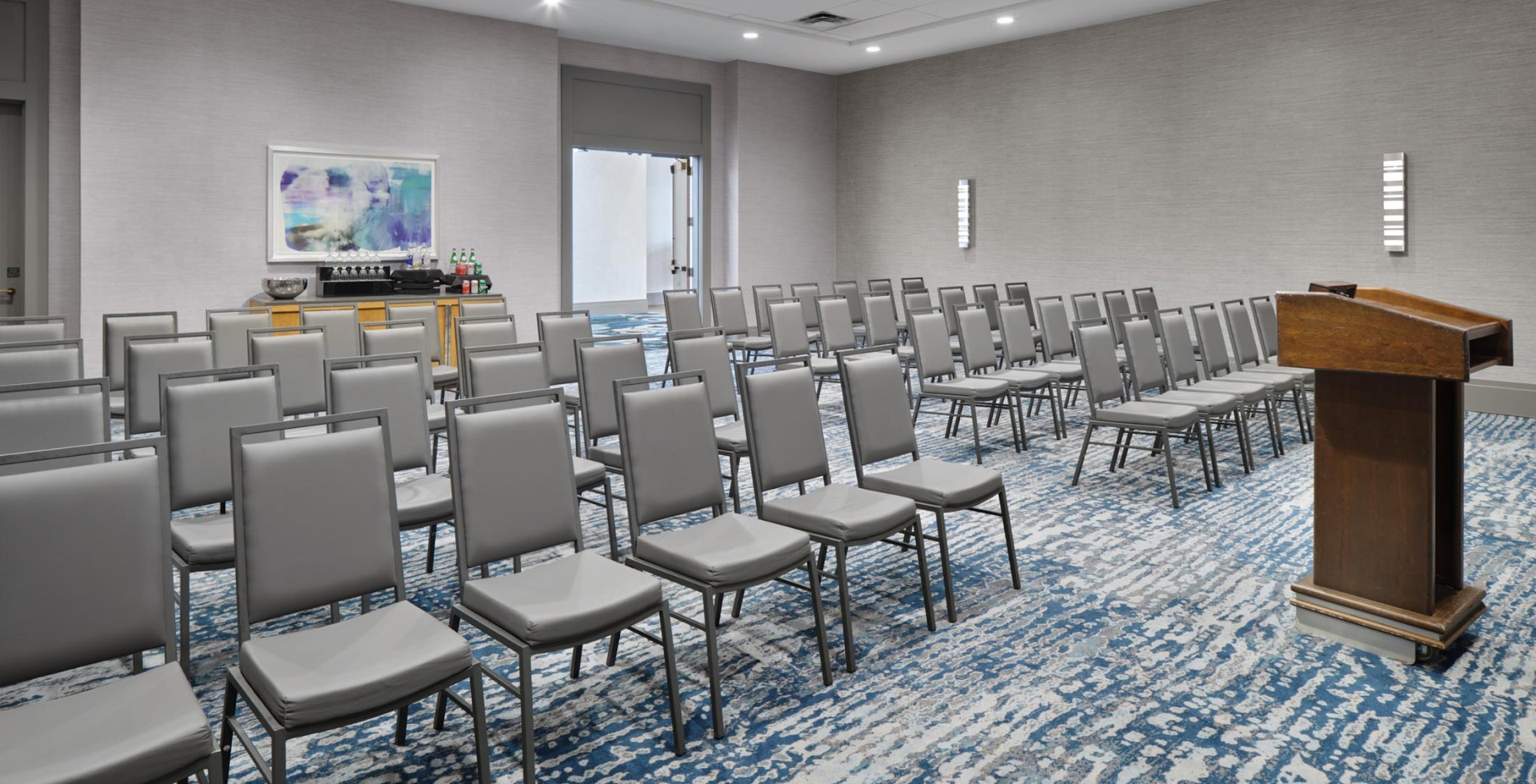 Eton Meeting & Event Space theater style setup with refreshment table