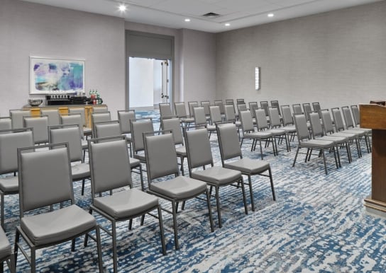 Eton Meeting & Event Space theater style setup with refreshment table