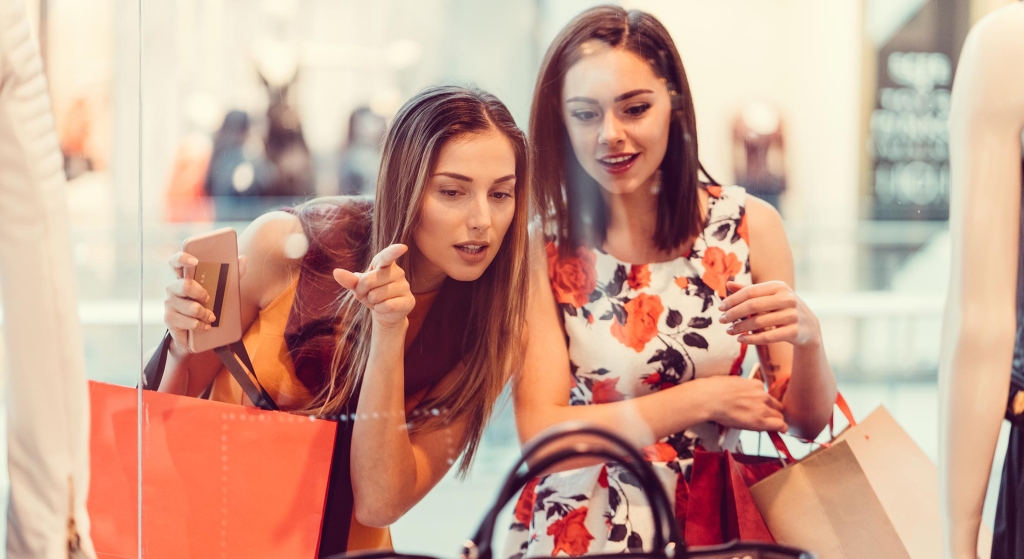 Two women window shopping