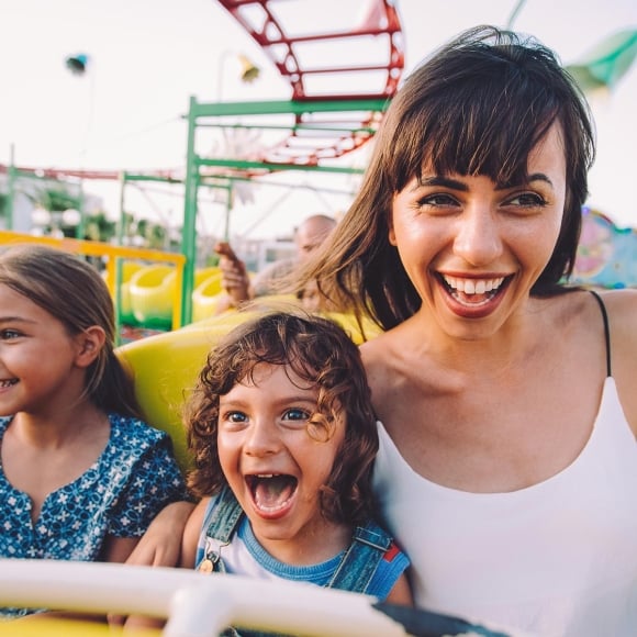 Family having fun on a roller coaster