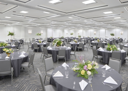 Hilton Ballroom set up in rounds for a dinner reception