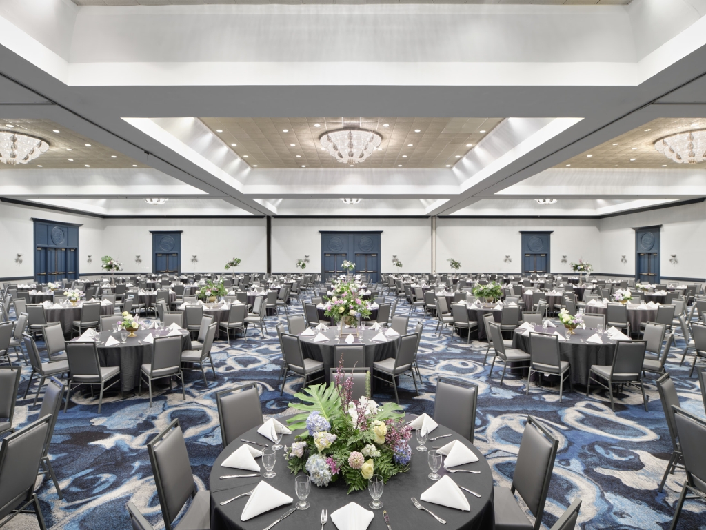 Kensington ballroom set with round tables for a wedding reception