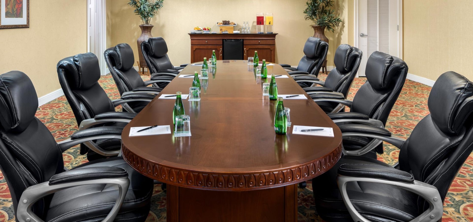Palmetto Palms executive meeting space with refreshment table