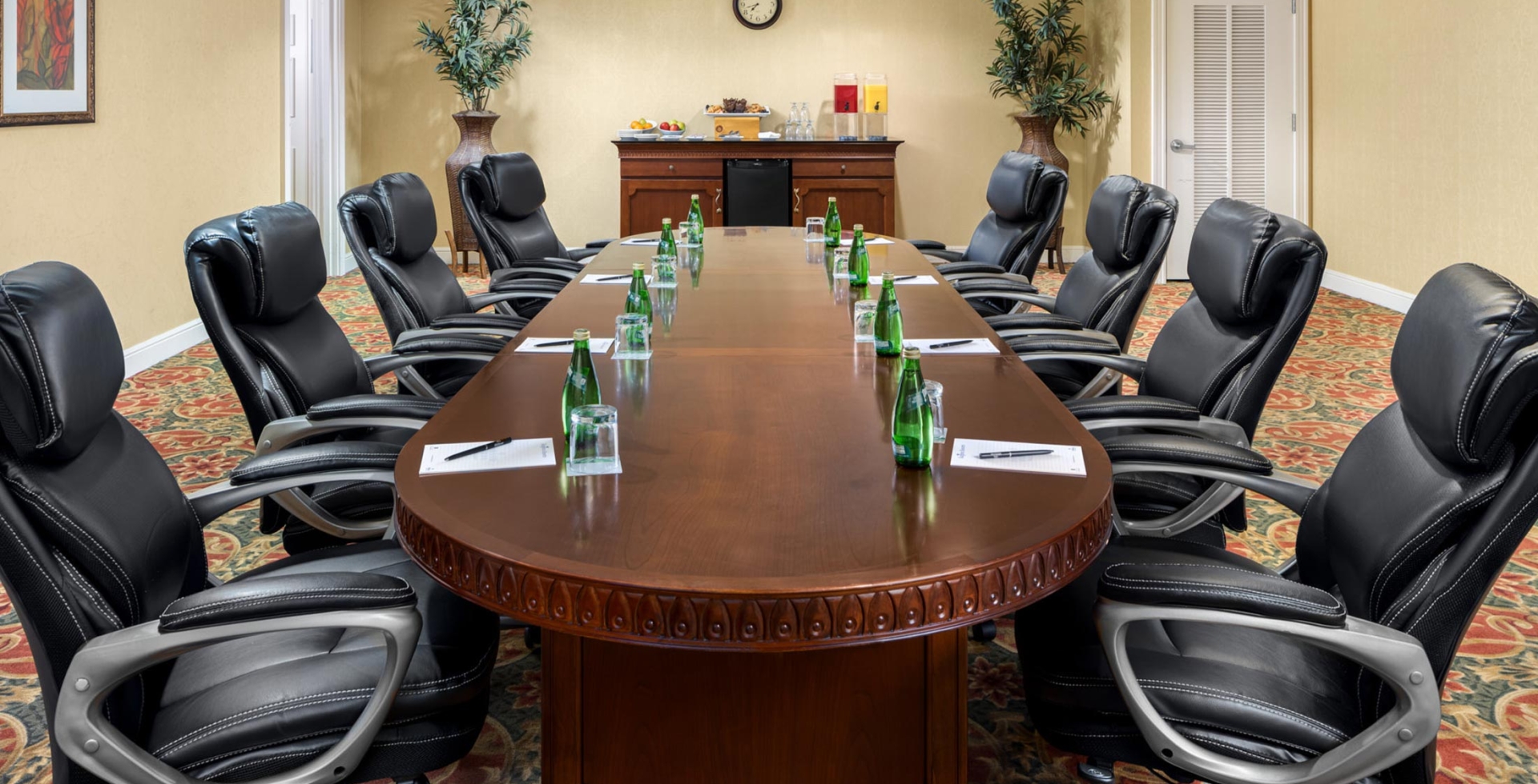 Palmetto Palms executive meeting space with refreshment table