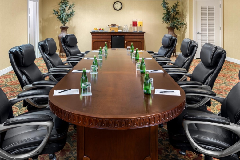 Palmetto Palms executive meeting space with refreshment table