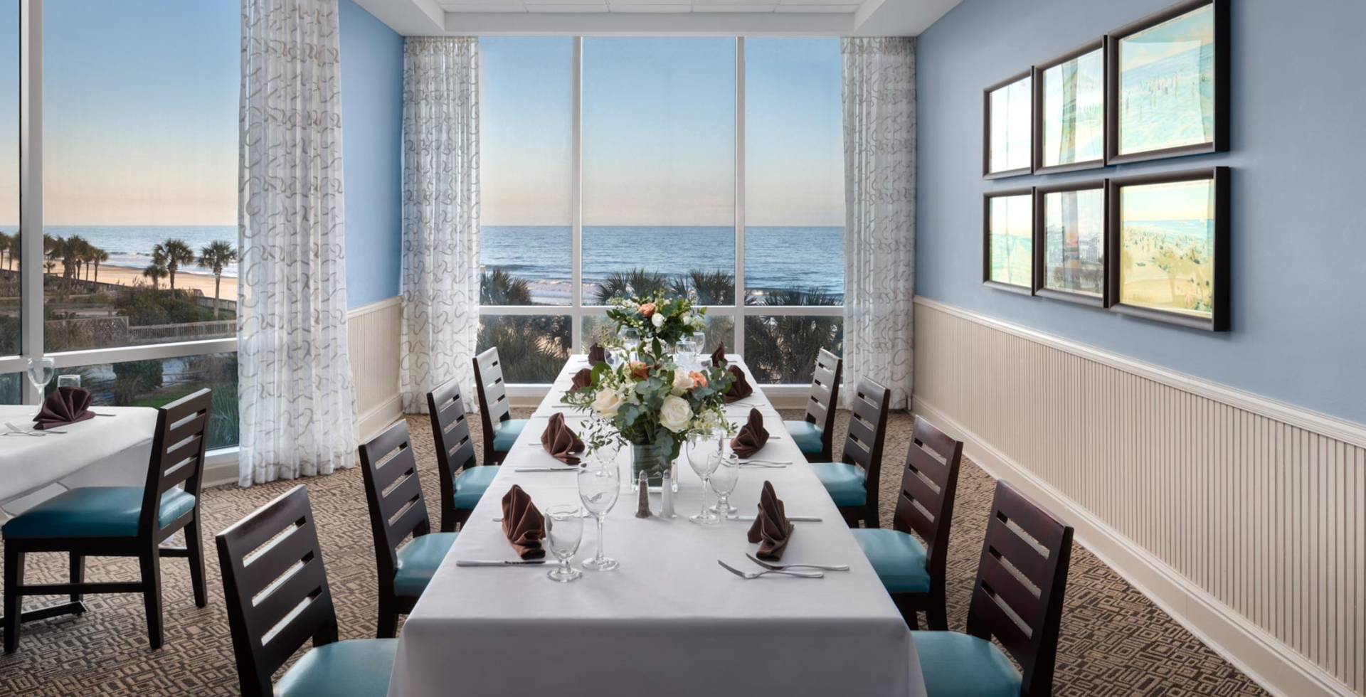 Cafe Amalfi private dining room long table set up with ocean views