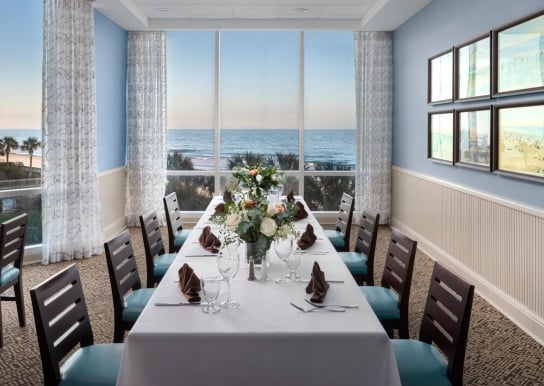 Cafe Amalfi private dining room long table set up with ocean views