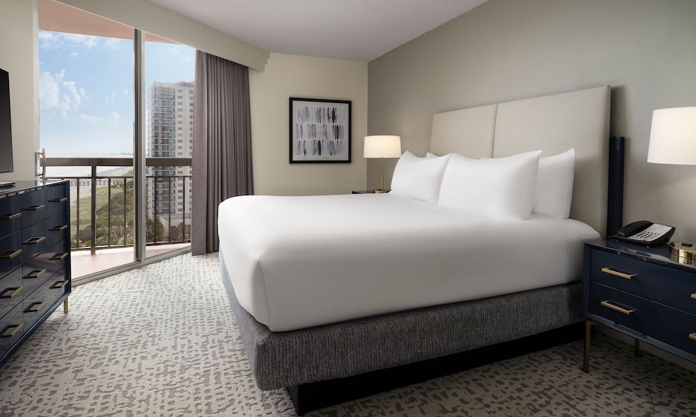 Embassy Suite guest room with balcony access