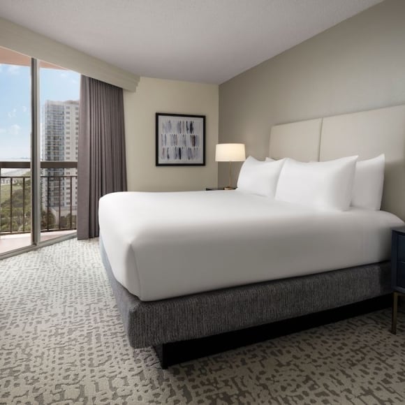 Embassy Suite guest room with balcony access