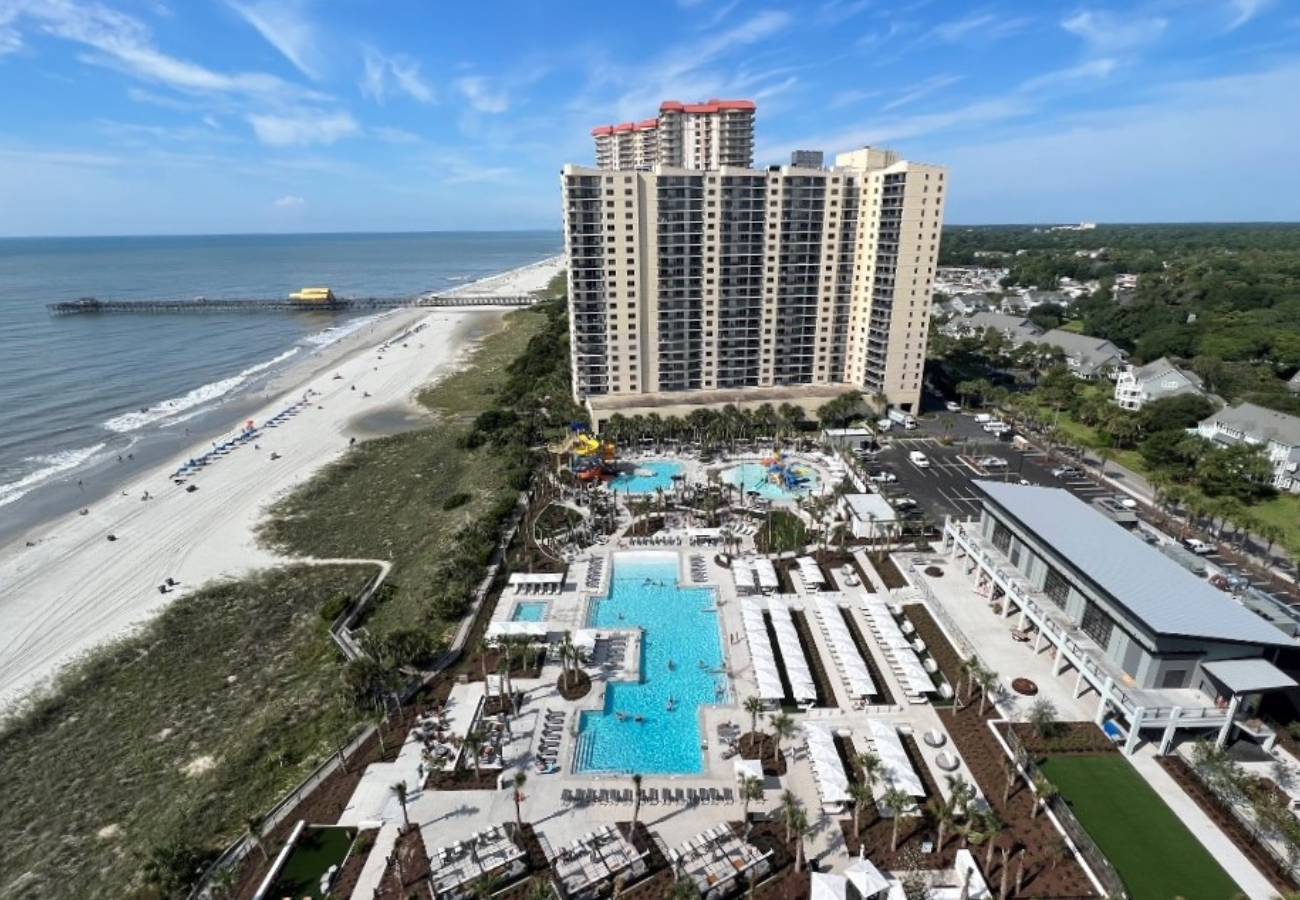 Aeriel of Currents Seaside Entertainment, Brighton condos, and the beach
