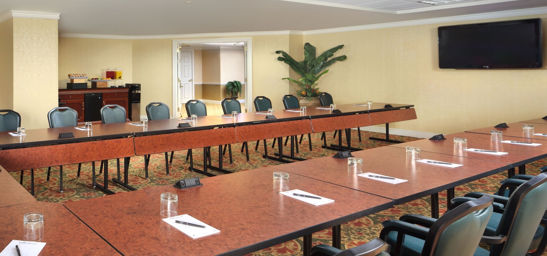 Savannah Palms meeting space set up U Shape with refreshments table