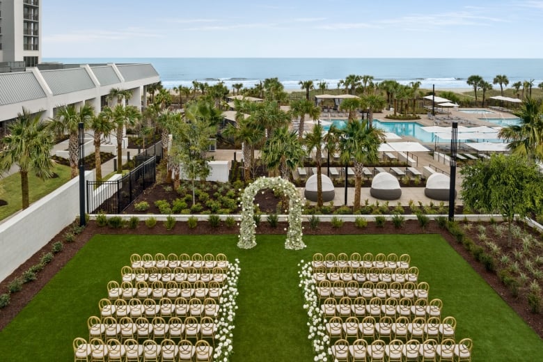 Currents Seaside Entertainment event lawn set up for a wedding ceremony