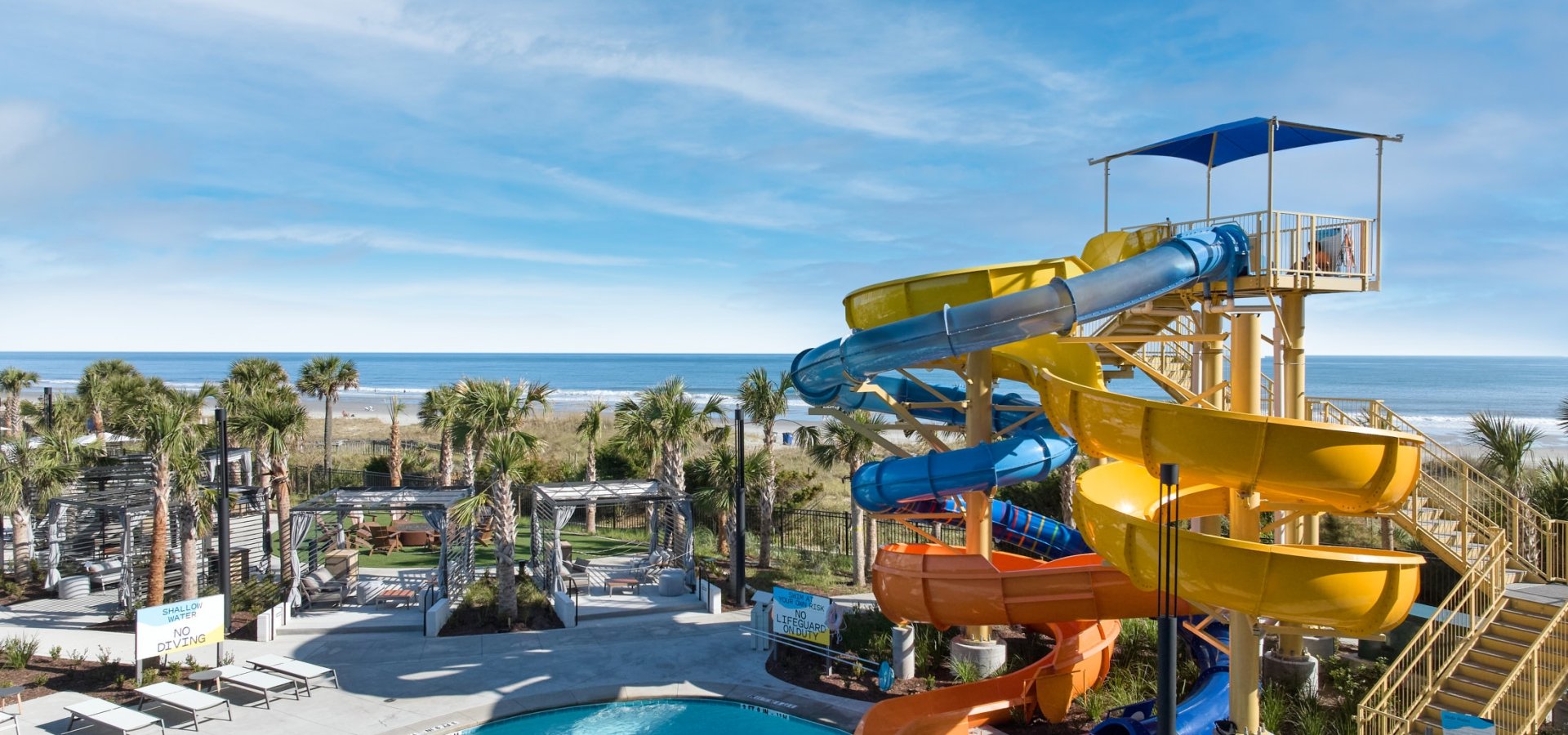 Currents Seaside Entertainment waterslides and pool facing the ocean