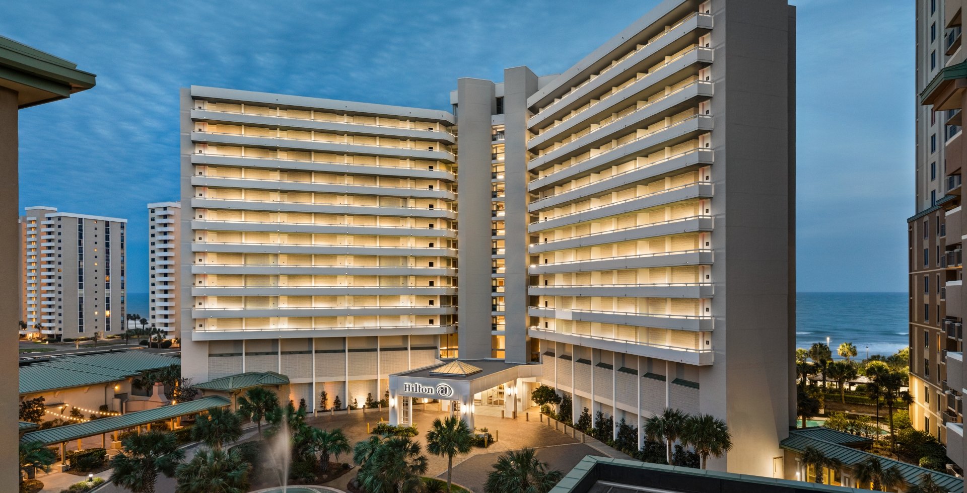 Hilton front entrance exterior at night