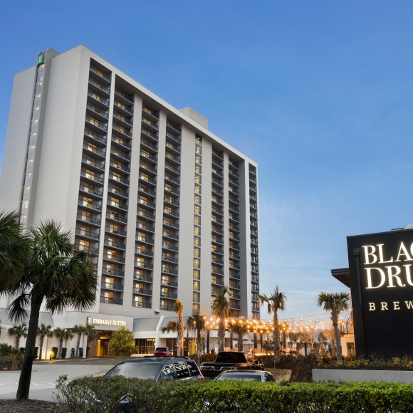 Exterior view of Embassy Suites and Black Drum Brewing