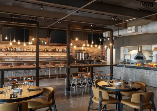 Interior of Black Drum Brewing bar area and pizza station