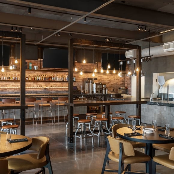 Interior of Black Drum Brewing bar area and pizza station