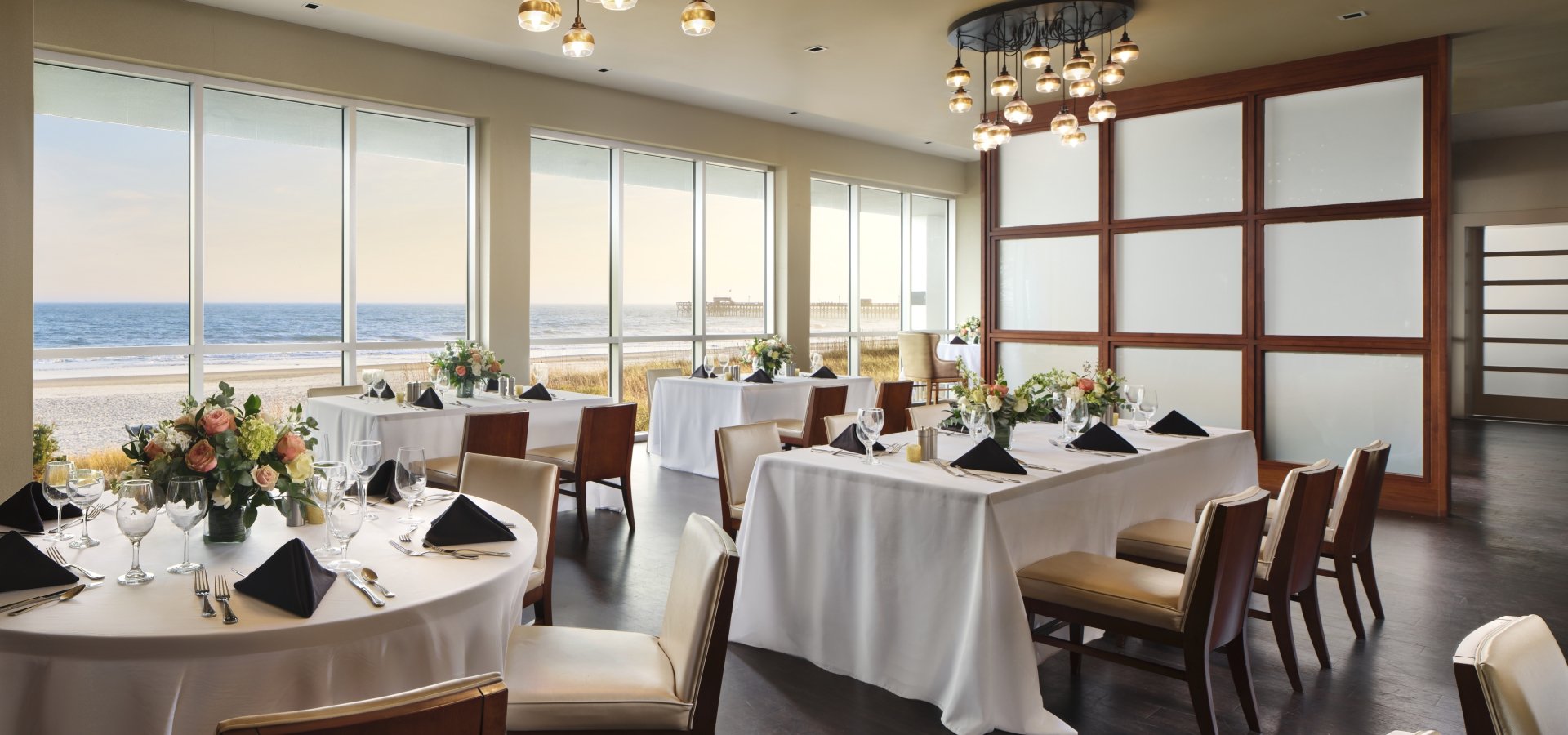 Vintage Twelve set up for a banquet event. You have a direct view of the ocean