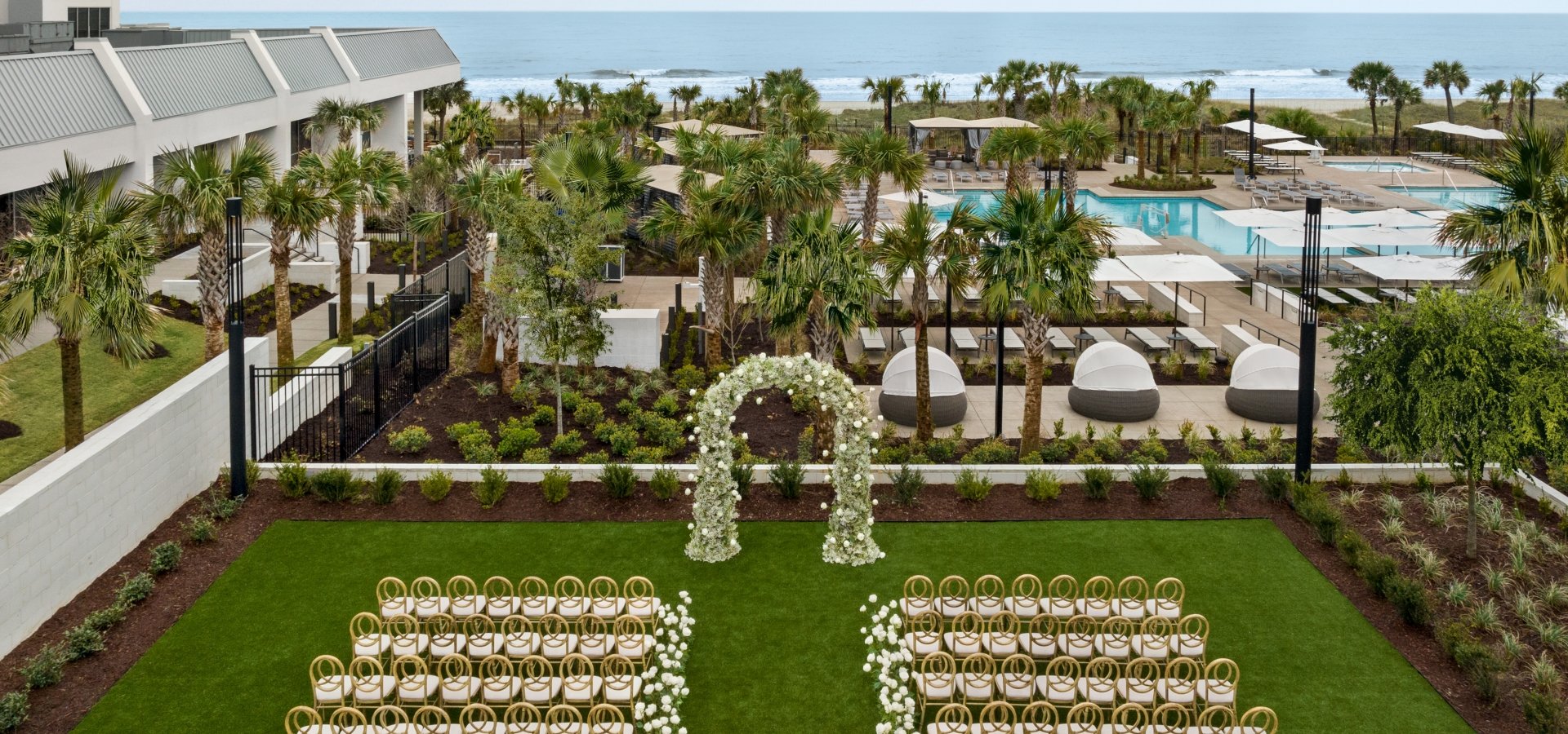 Currents Seaside Entertainment event lawn set up for a wedding ceremony
