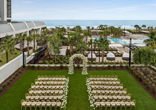 Currents Seaside Entertainment event lawn set up for a wedding ceremony
