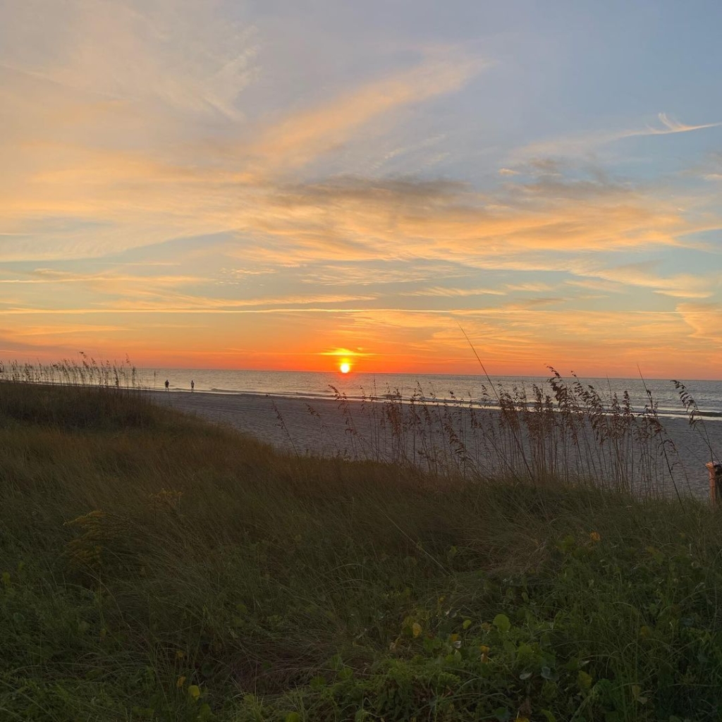 A sunset on a beach