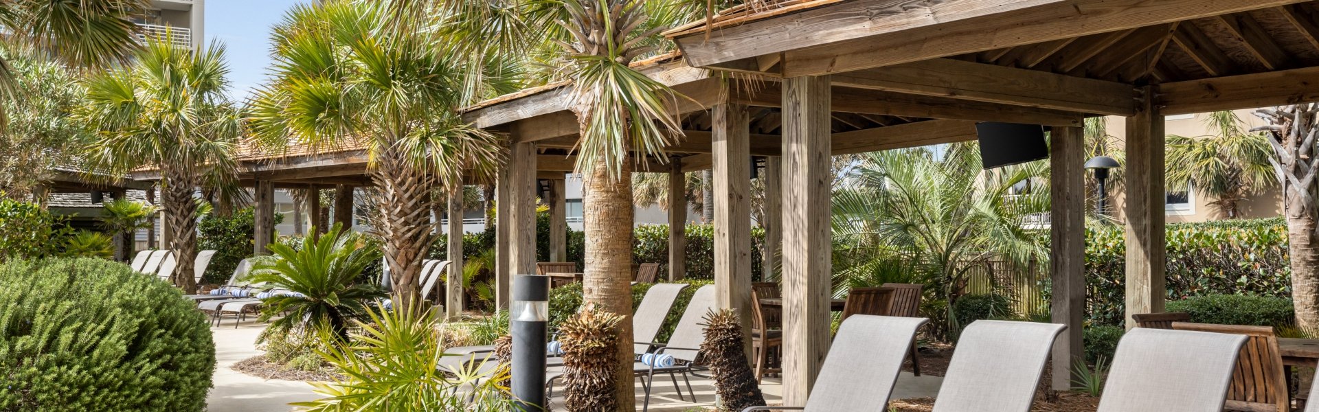 Poolside Cabanas at the Hilton sand bottom pool
