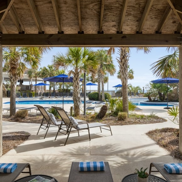 View from inside the cabana looking toward the Hilton sand bottom pool
