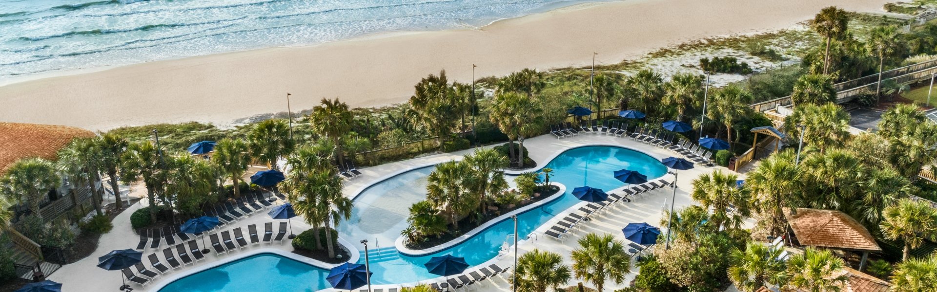 Aerial of the sand bottom pool and beach
