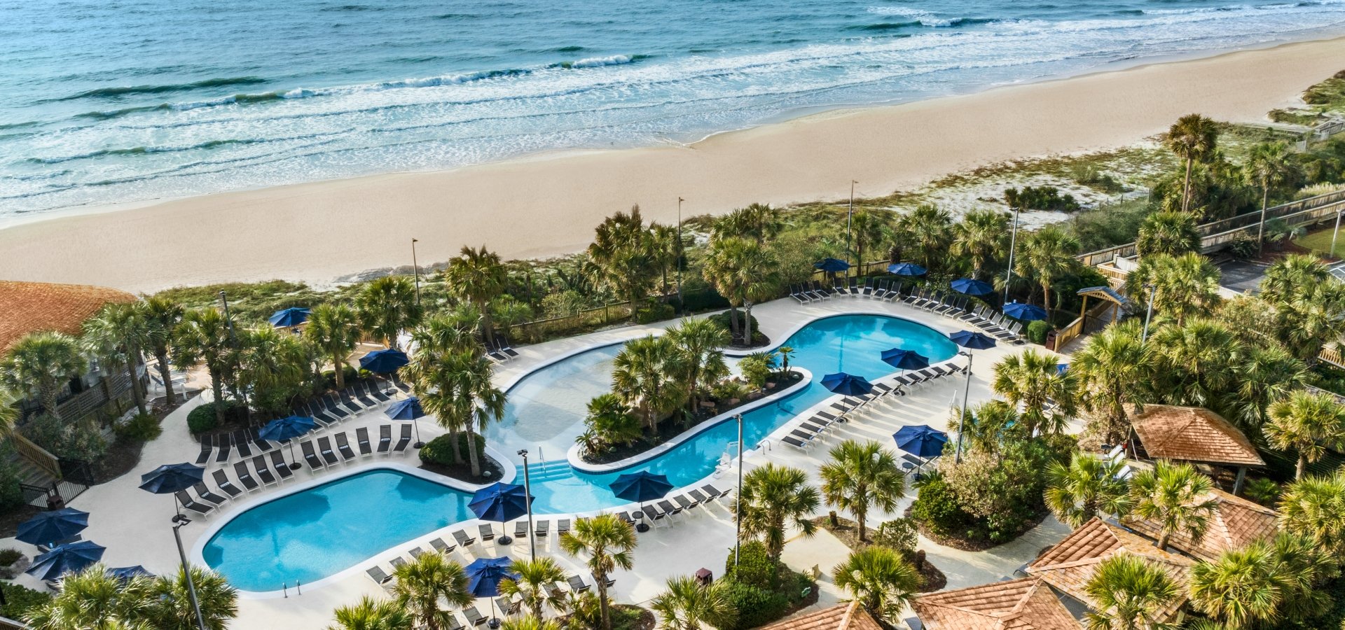 Aerial of the sand bottom pool and beach