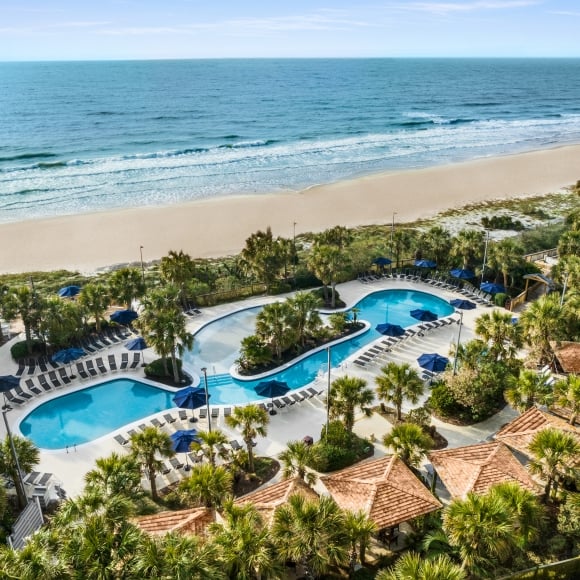 Aerial of the sand bottom pool and beach