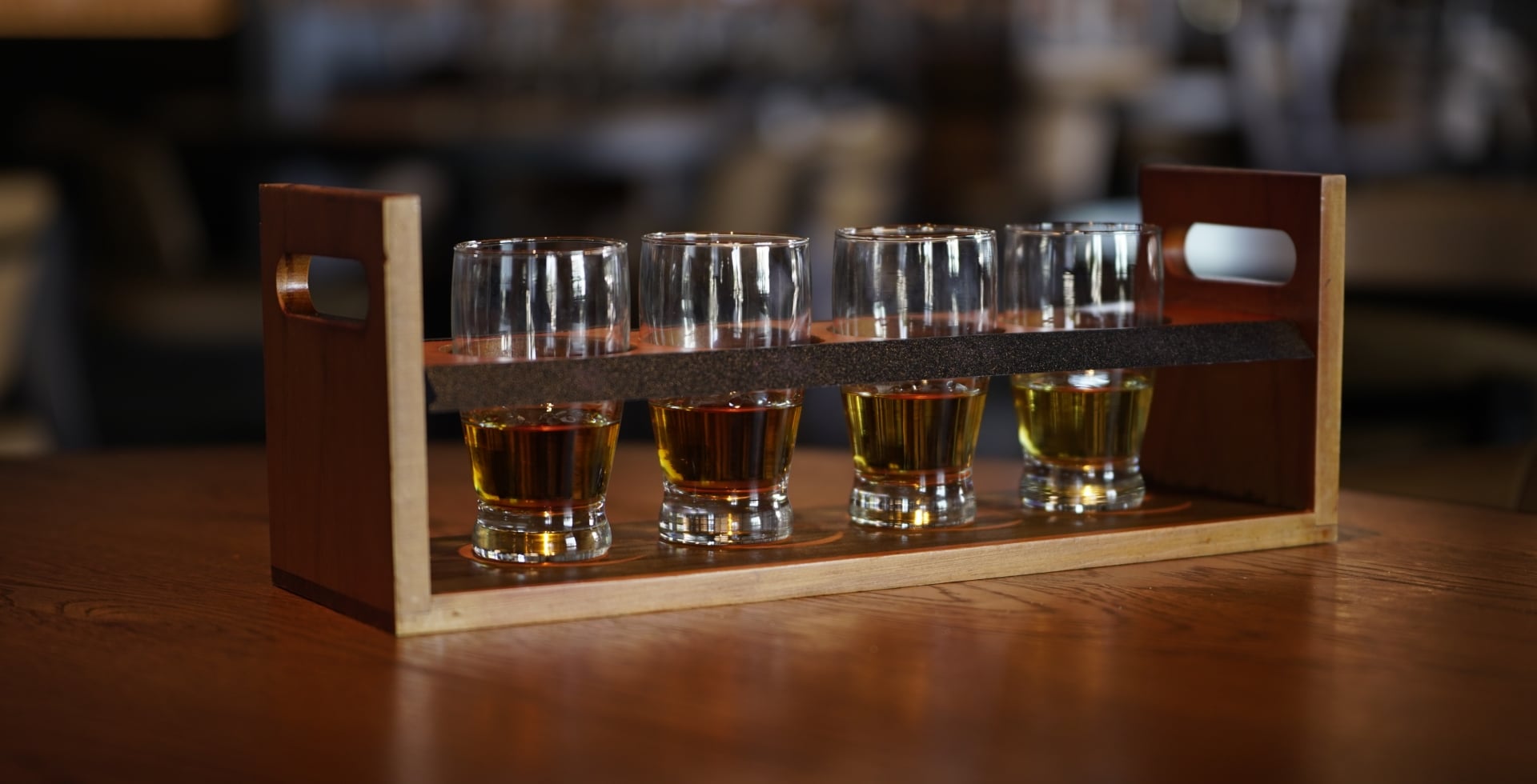 Black Drum Brewing whiskey flight on a restaurant table