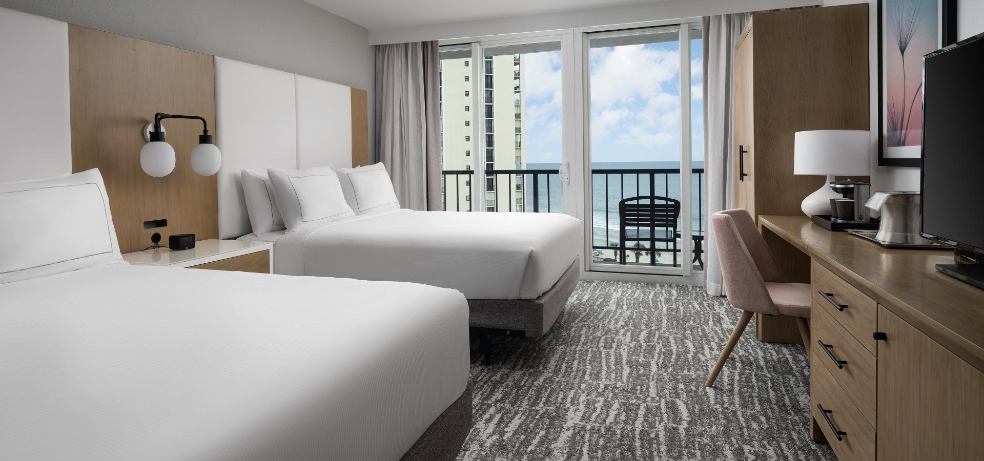 Double bed guest room at Hilton with a balcony