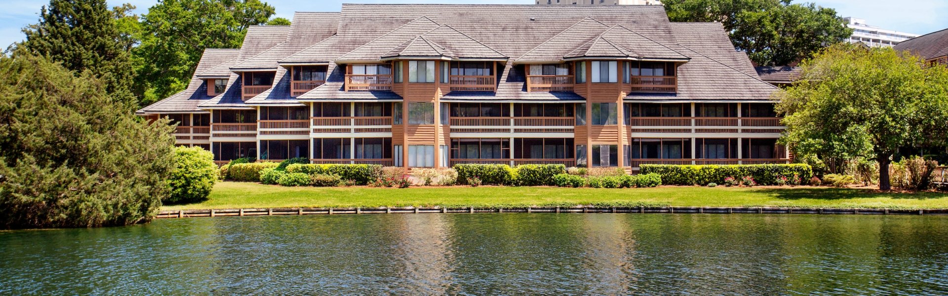 Exterior pond view of Kingston Condos