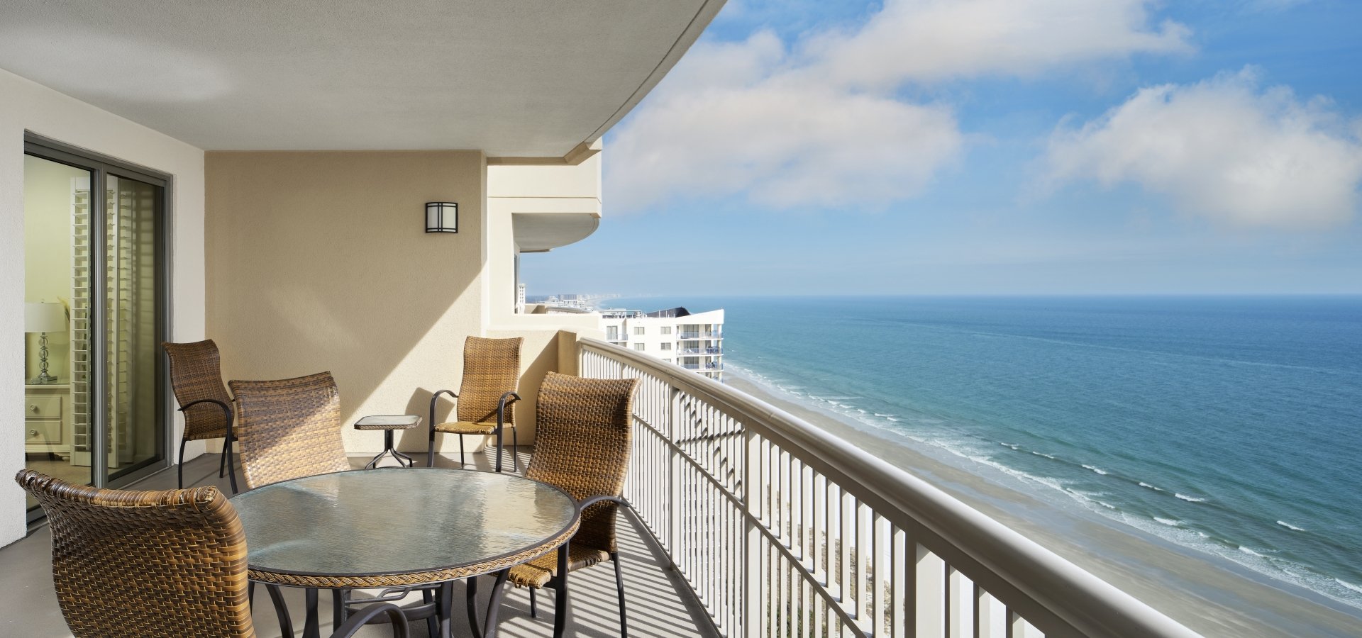 Margate condo balcony ocean view with table and chairs