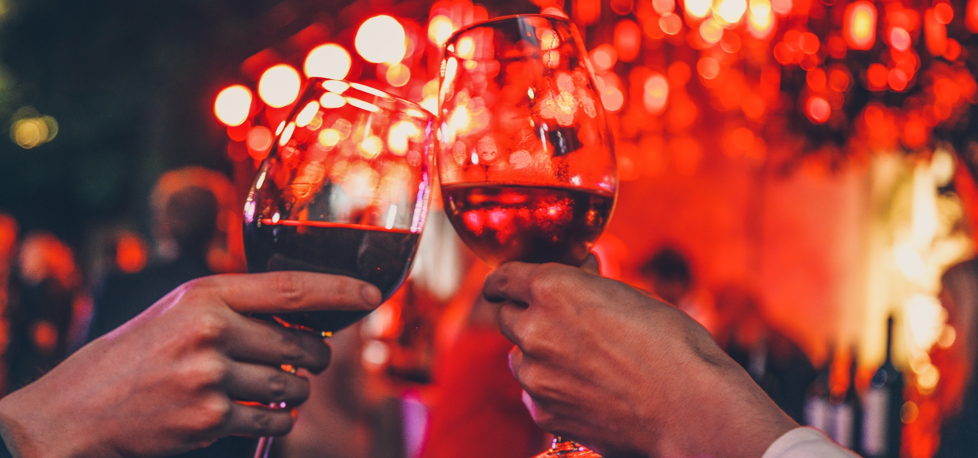 Couple toasting wine glasses
