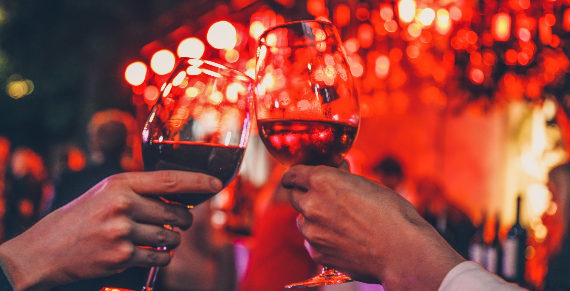 Couple toasting wine glasses